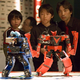 Illustration for article titled Girl Pilots Japanese Fighting Robot With Gundam Master/Slave Control Suit